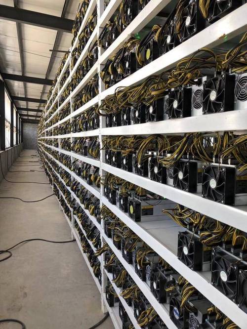 Expansive cryptocurrency mining farm at dusk
