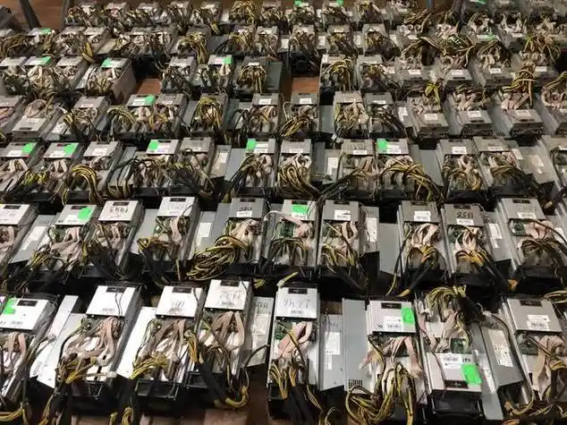 A large-scale mining farm filled with racks of mining rigs operating under optimized cooling systems